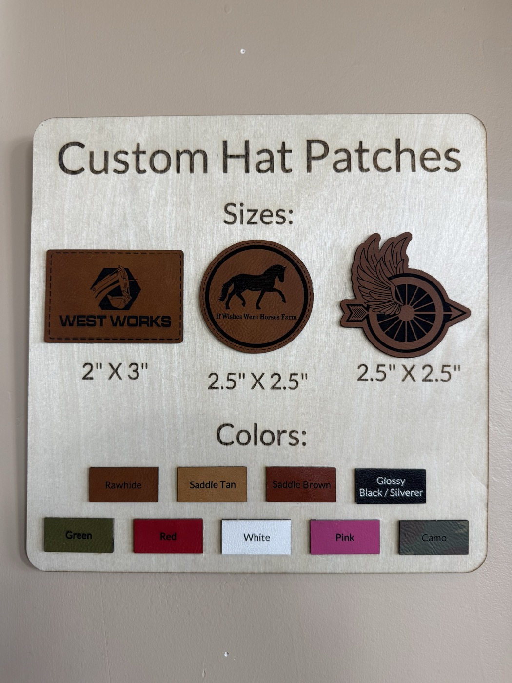 Custom leather hat patches display